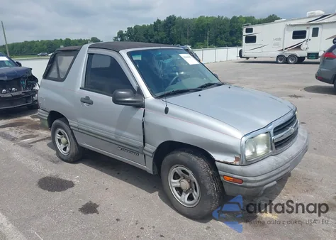 2003 Chevrolet Tracker из США, поврежденный, VIN 2CNBE18C136952611